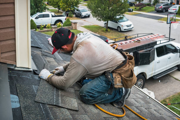 Professional Roofing technician working in Marshfield, MA